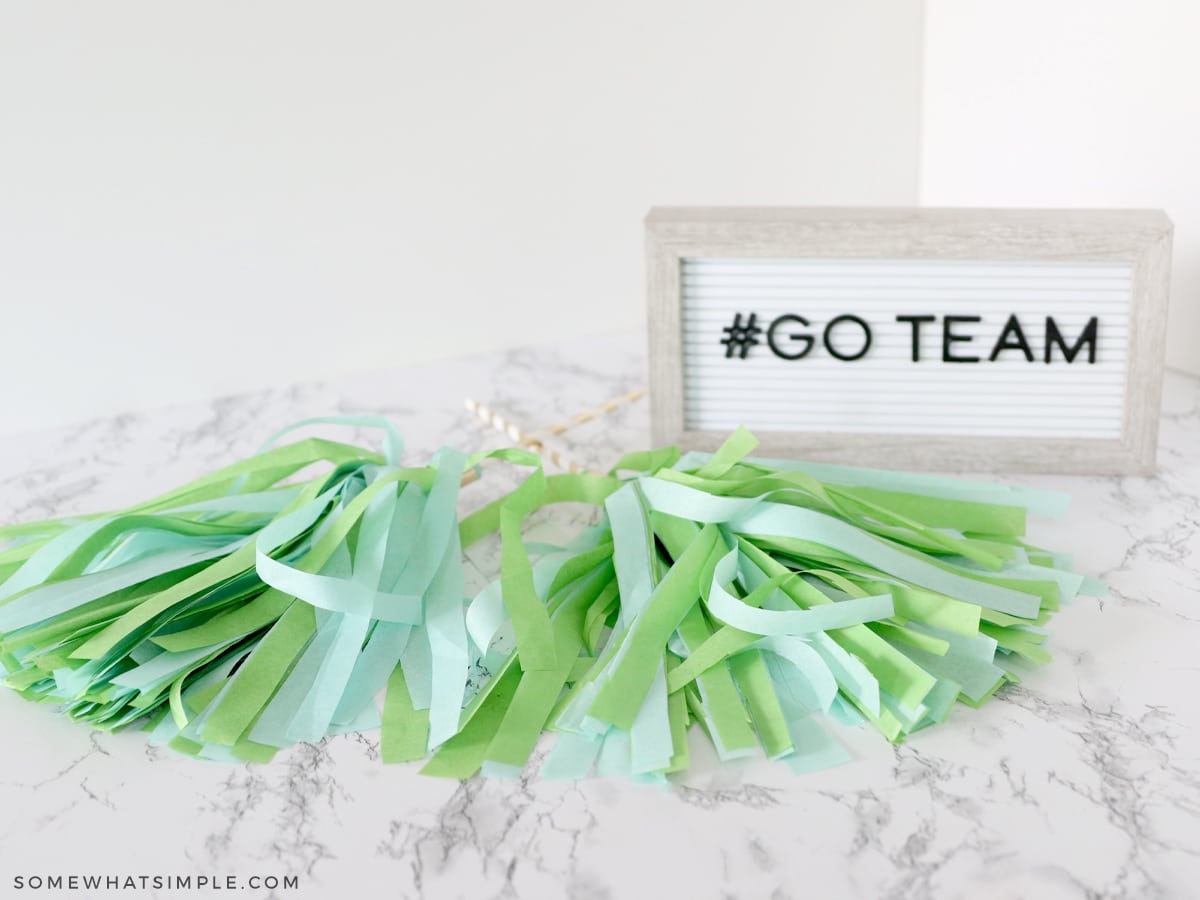 tissue paper pom poms laying on the counter