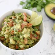 avocado salsa in a white bowl