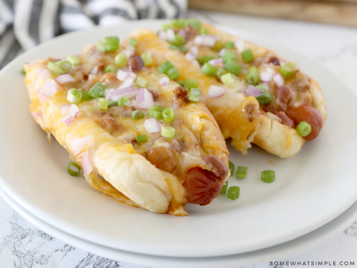 close up of baked chili dogs