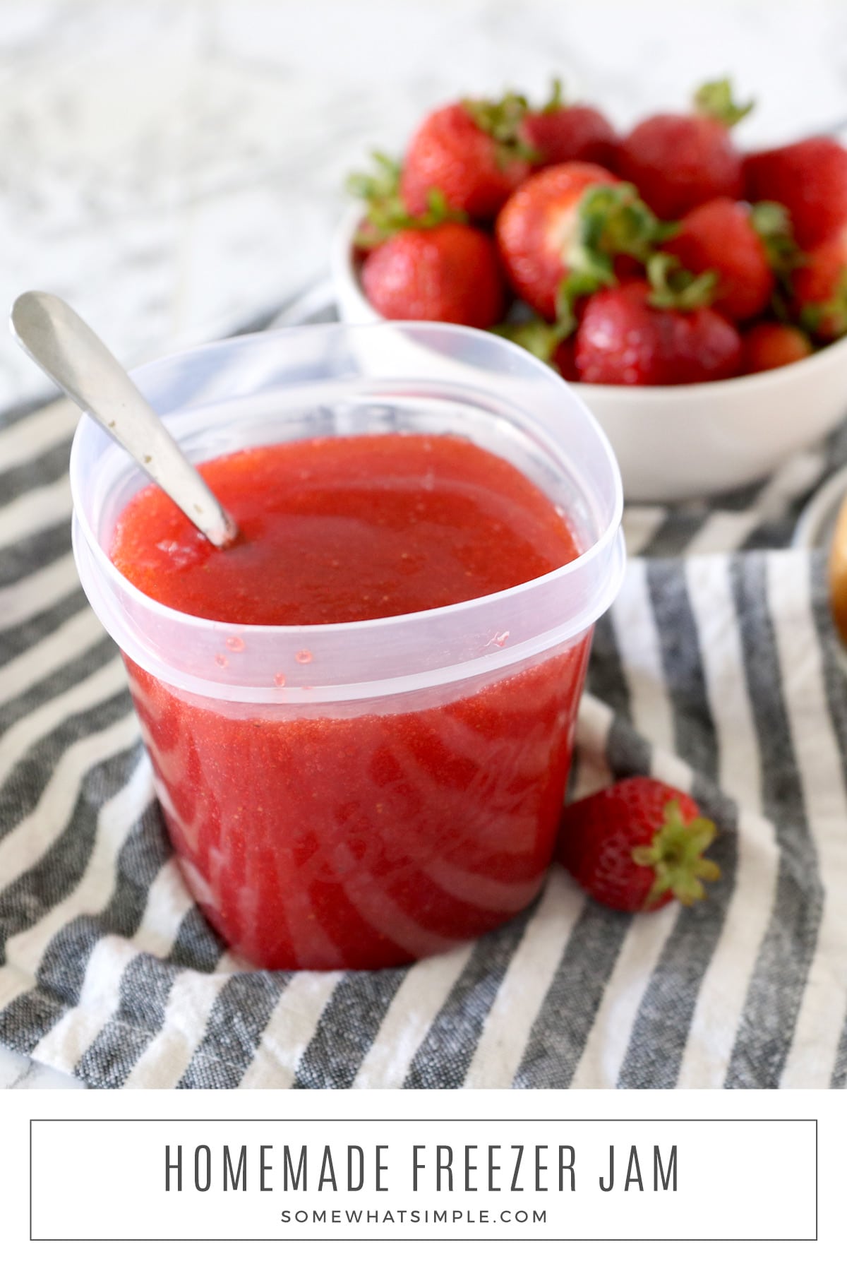 Strawberry freezer jam is super simple to make and it tastes so much better than anything you can buy in the store! via @somewhatsimple