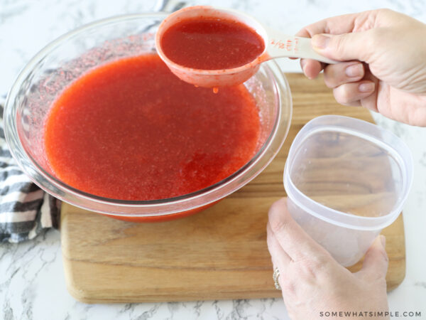 filling containers with freezer jam
