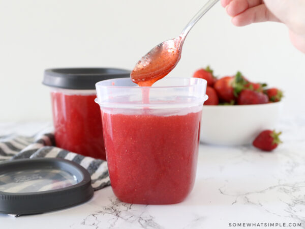 strawberry freezer jam on a spoon