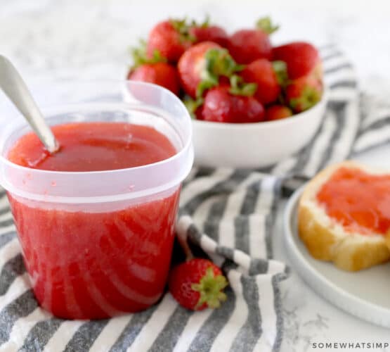 strawberry freezer jam with berries and bread