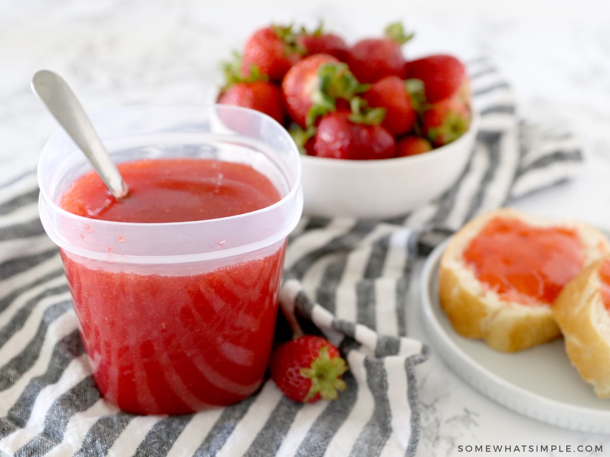 strawberry freezer jam with berries and bread