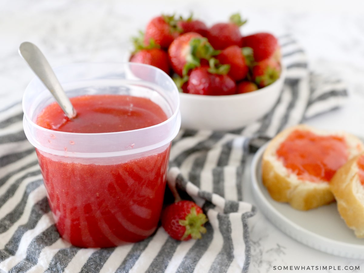 https://www.somewhatsimple.com/wp-content/uploads/2021/08/freezer-jam-strawberry.jpg