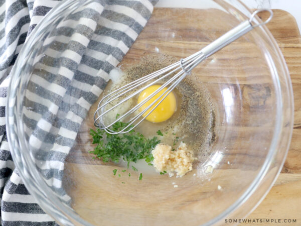 making an egg wash for a chicken dinner