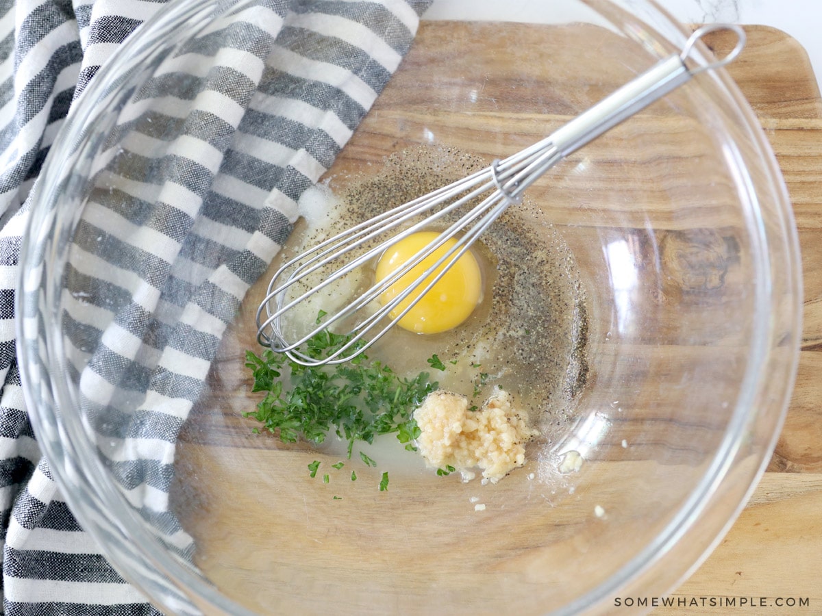 making an egg wash for a chicken dinner