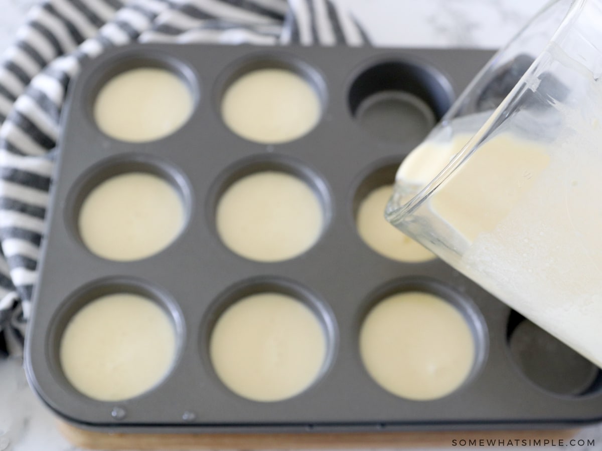 pouring batter into muffin tins