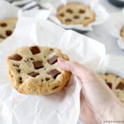 num num cookies being held in hand