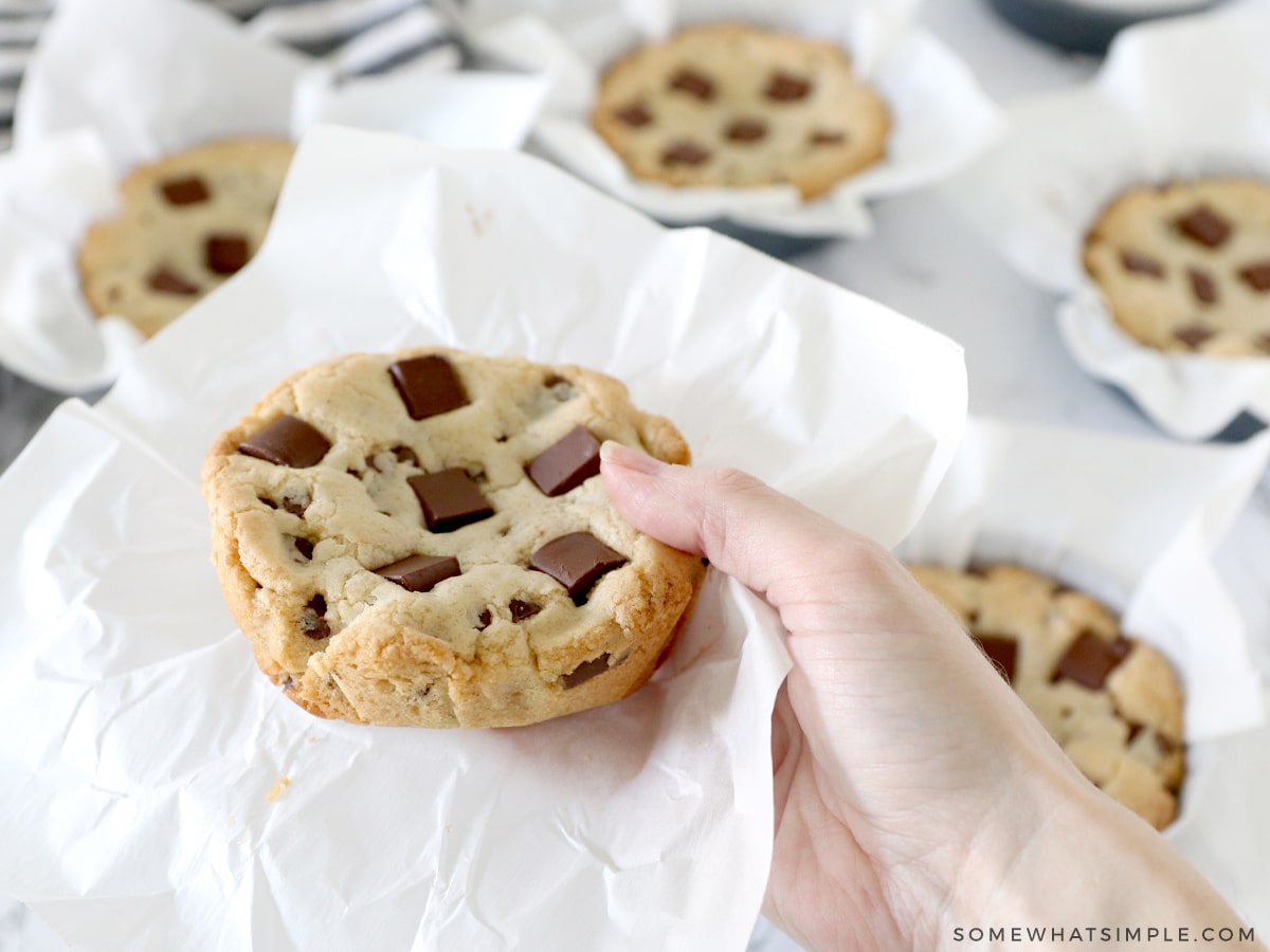 num num cookies being held in hand