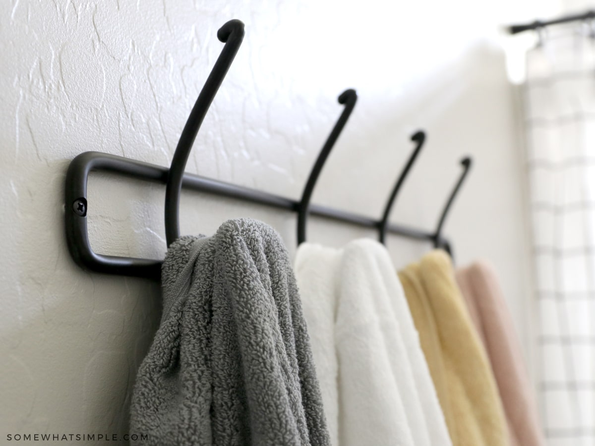 https://www.somewhatsimple.com/wp-content/uploads/2021/09/boy-girl-shared-bathroom-hooks.jpg