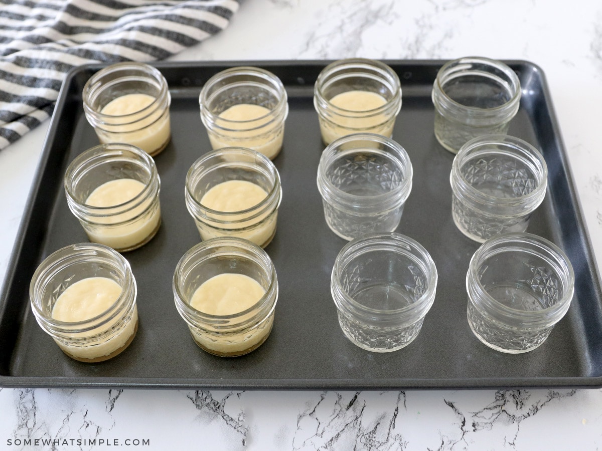 adding white cake mix to mason jars