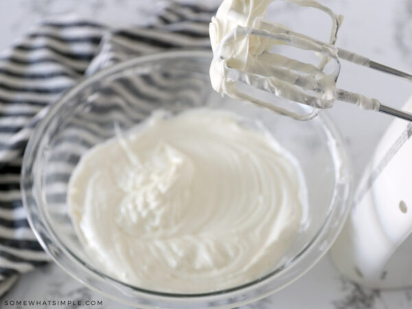 mixing a cream cheese frosting