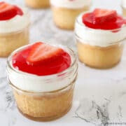 mini mason jars filled with strawberry cake