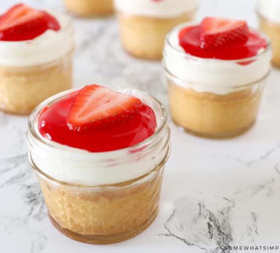 mini mason jars filled with strawberry cake