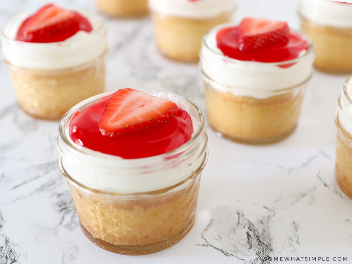 mini mason jars filled with strawberry cake