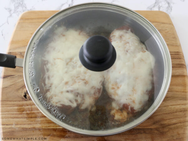 covering a pan with chicken