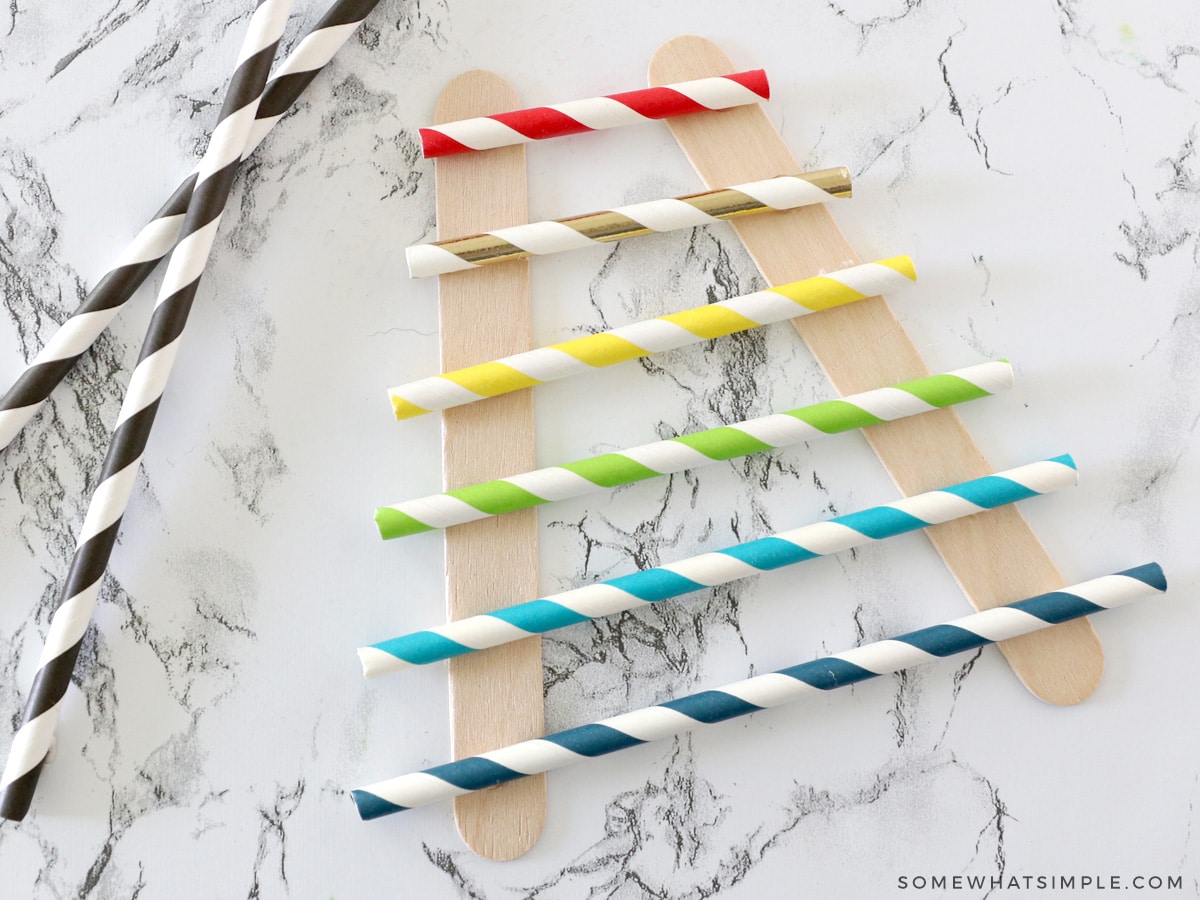 how to make a homemade xylophone with straws and popsicle sticks