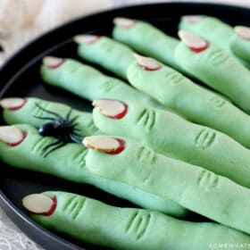 witch finger cookies on a black tray