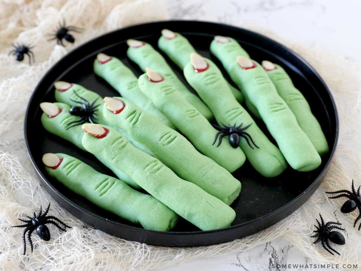 plate of green witch finger cookies