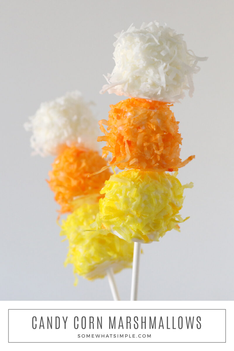 long image of 2 candy corn marshmallow kabobs