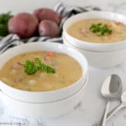two bowls of potato cheddar soup