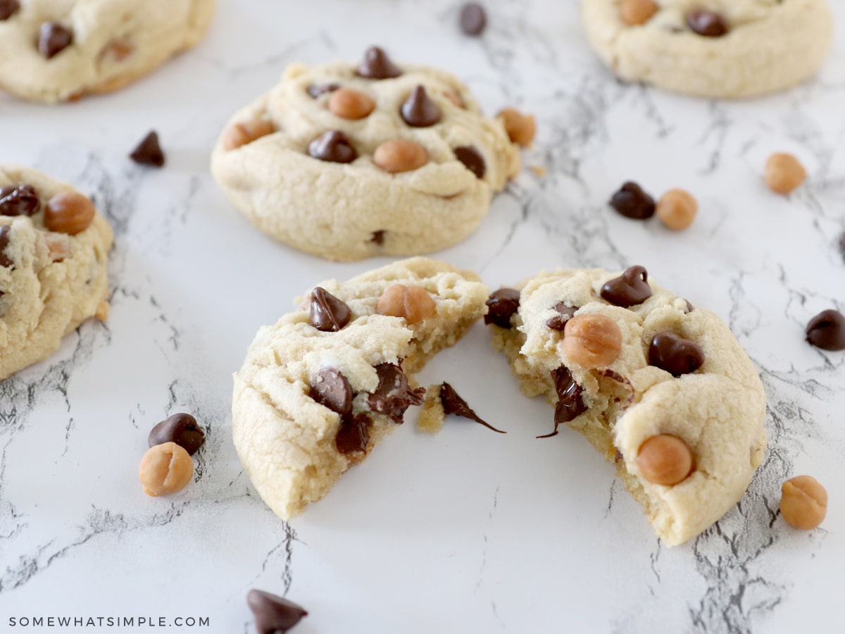 soft and chewy caramel chocolate chip cookie split open