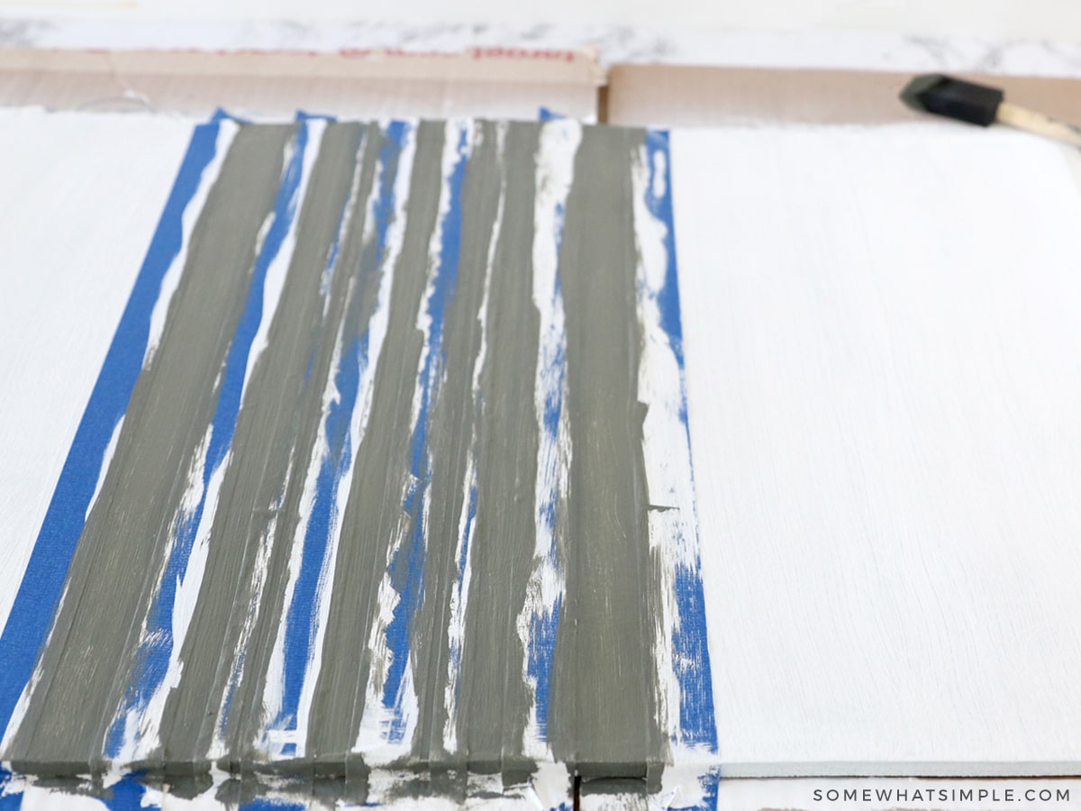adding gray stripes to a painted kitchen mat