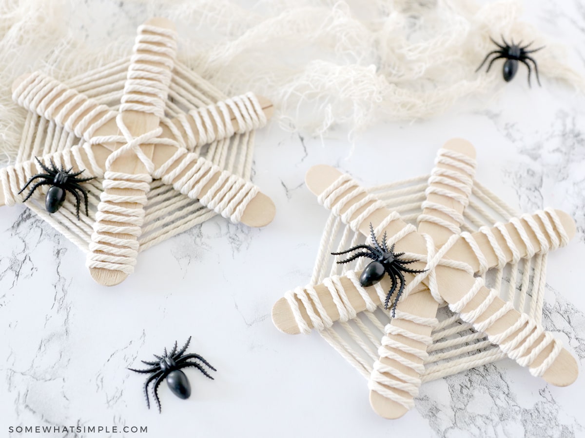 spider webs made from popsicle sticks