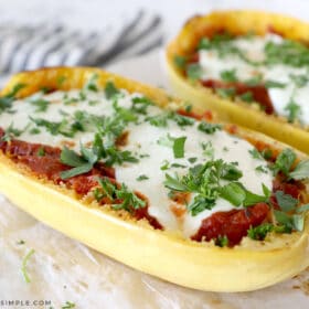 Spaghetti Squash with mozarella cheese and basil sprinkled over the top