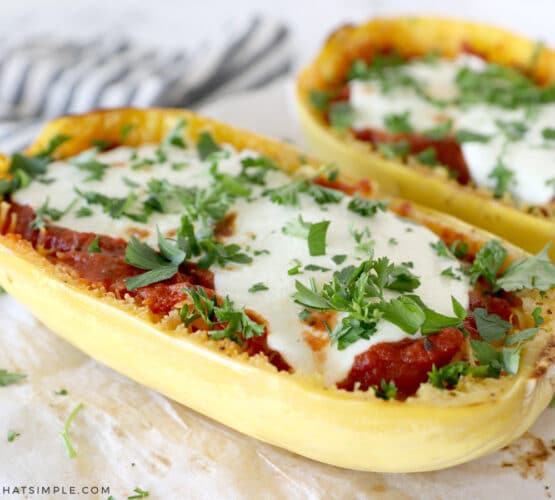 Spaghetti Squash with mozarella cheese and basil sprinkled over the top
