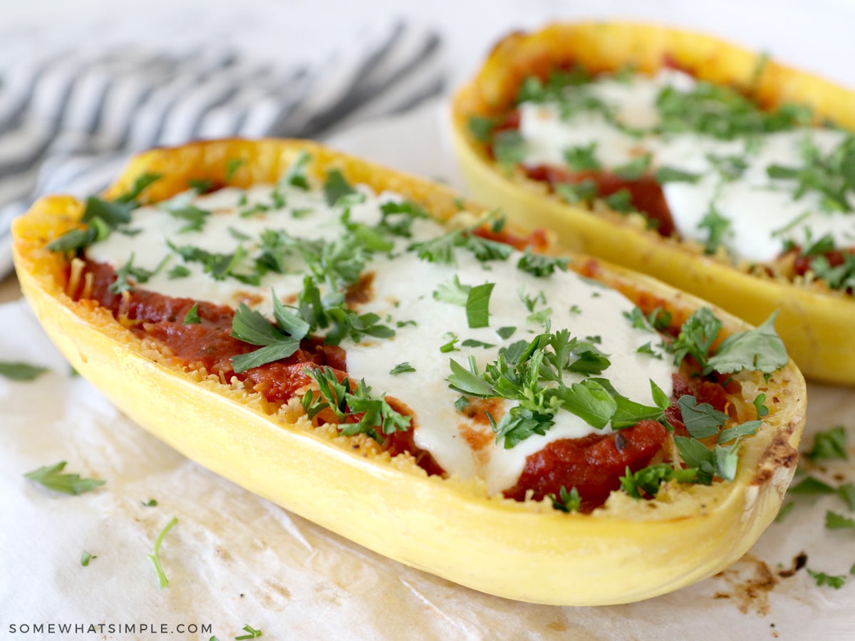 Spaghetti Squash with mozarella cheese and basil sprinkled over the top