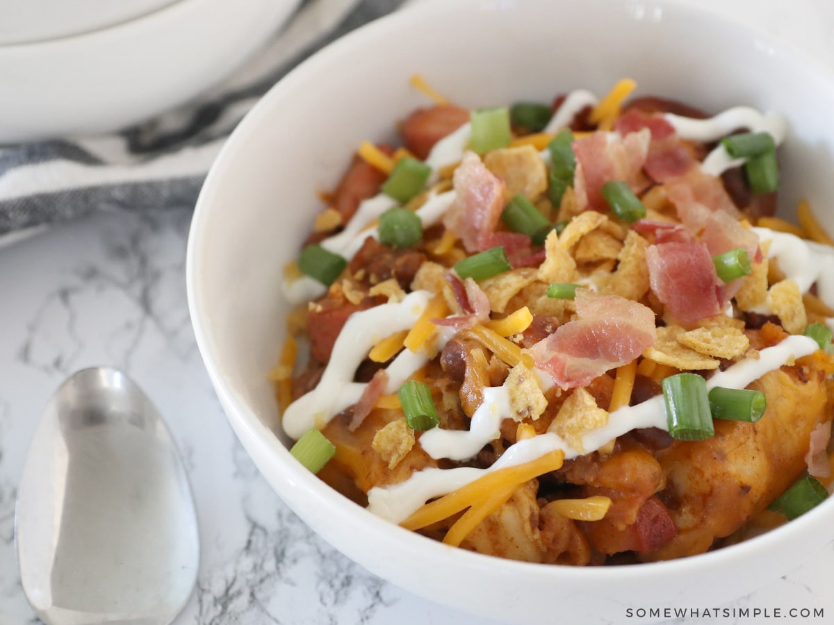 close up of a bowl with chili dog casserole in it
