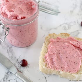 cranberry butter on a piece of bread on the counter