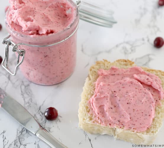cranberry butter on a piece of bread on the counter