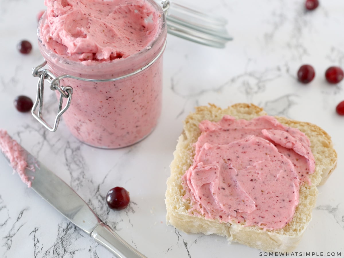 cranberry butter on a piece of bread on the counter