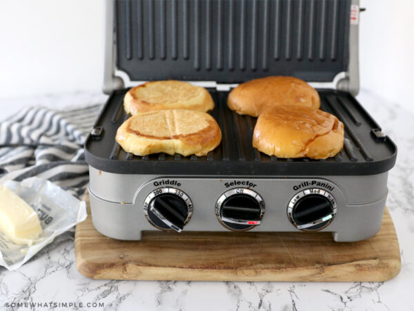 toasting brioche buns on a griddle
