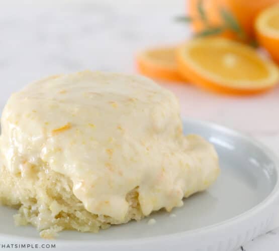 gooey orange rolls on a plate