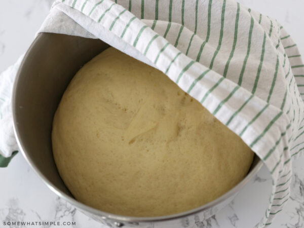 letting the dough rise in a bowl