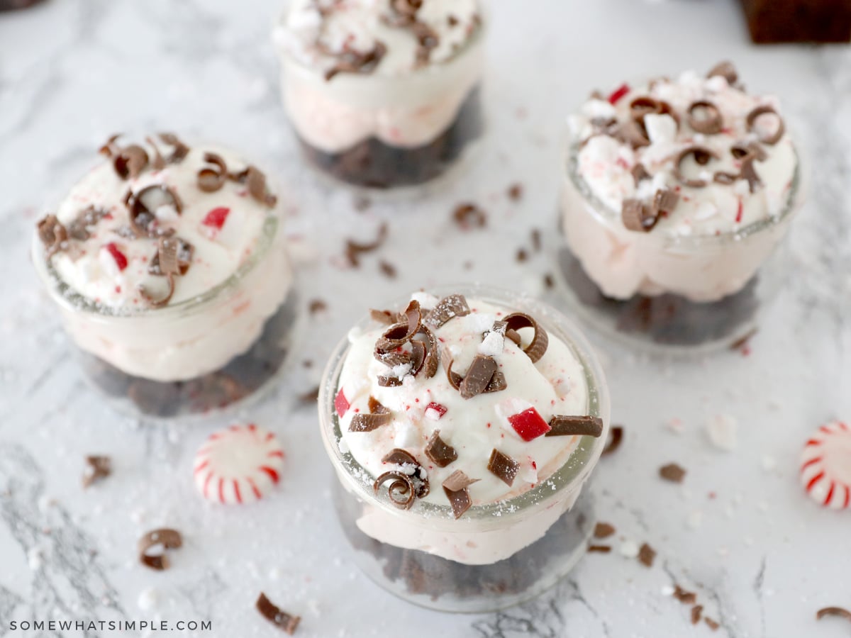 4 small jars with peppermint parfaits