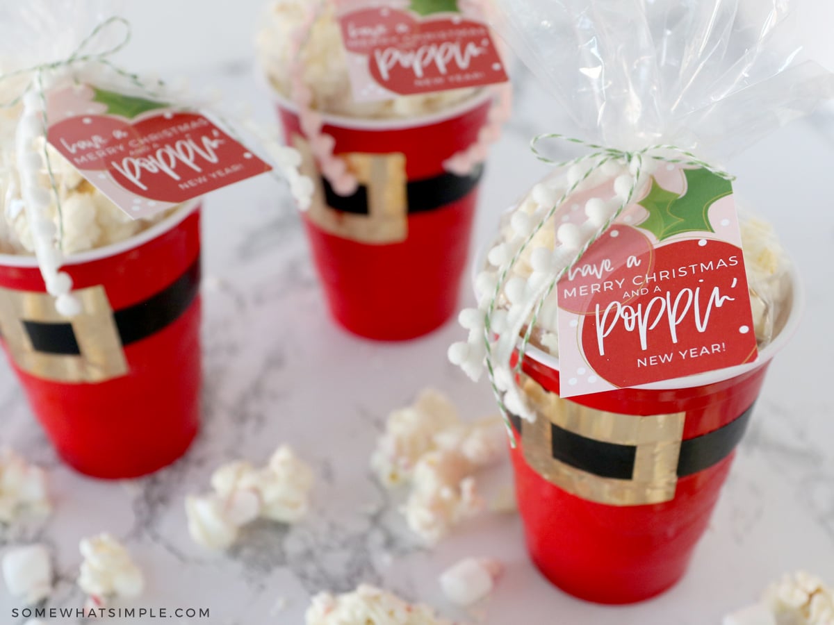 white chocolate popcorn in santa cups