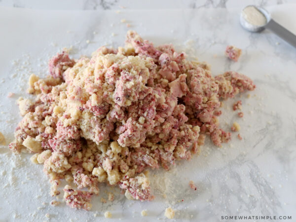 shrotbread cookie dough in a pile on a white counter