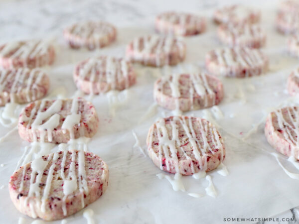 drizzling glaze over shortbread cookies