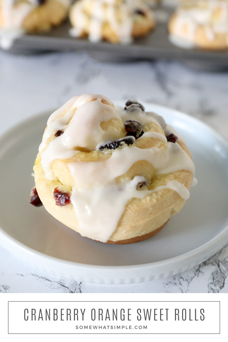 long image and close up of a cranberry orange weet roll