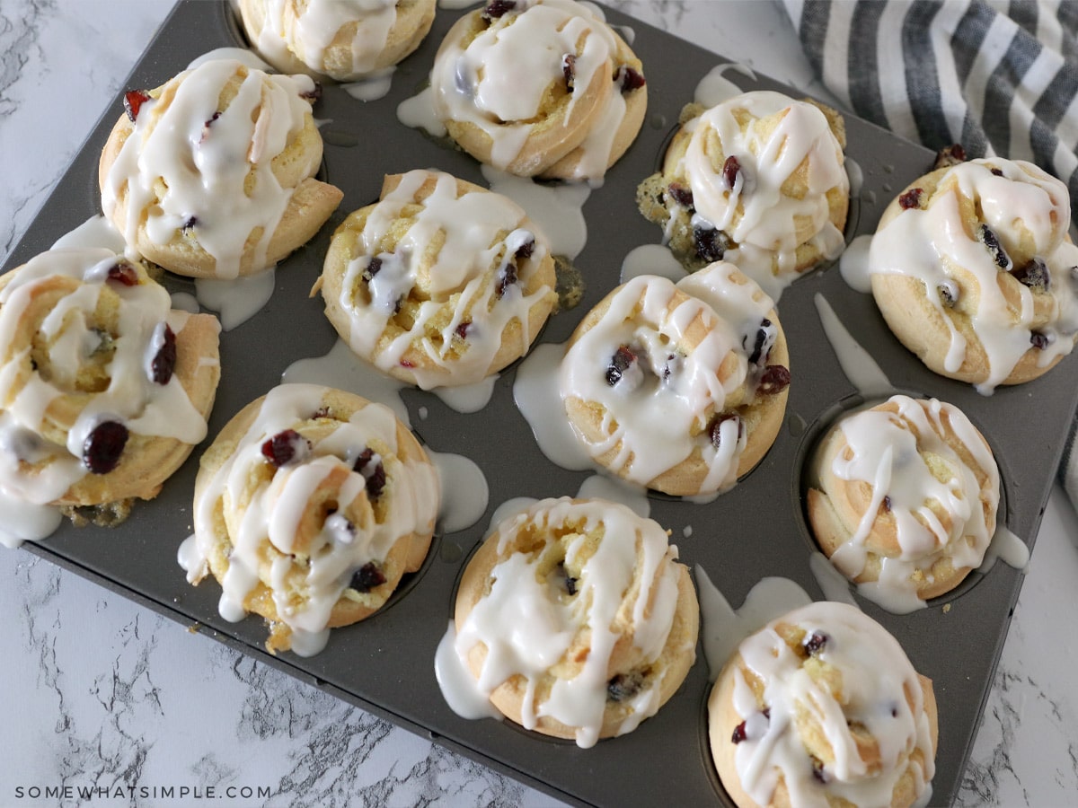 top view looking down at glazed cranberry orange sweet rolls