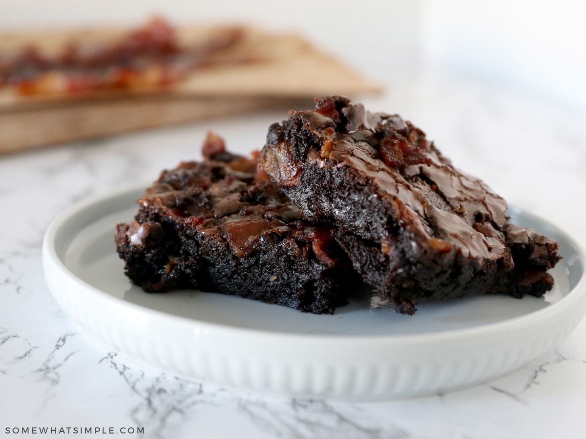 small plate with 2 fudgy brownies on top