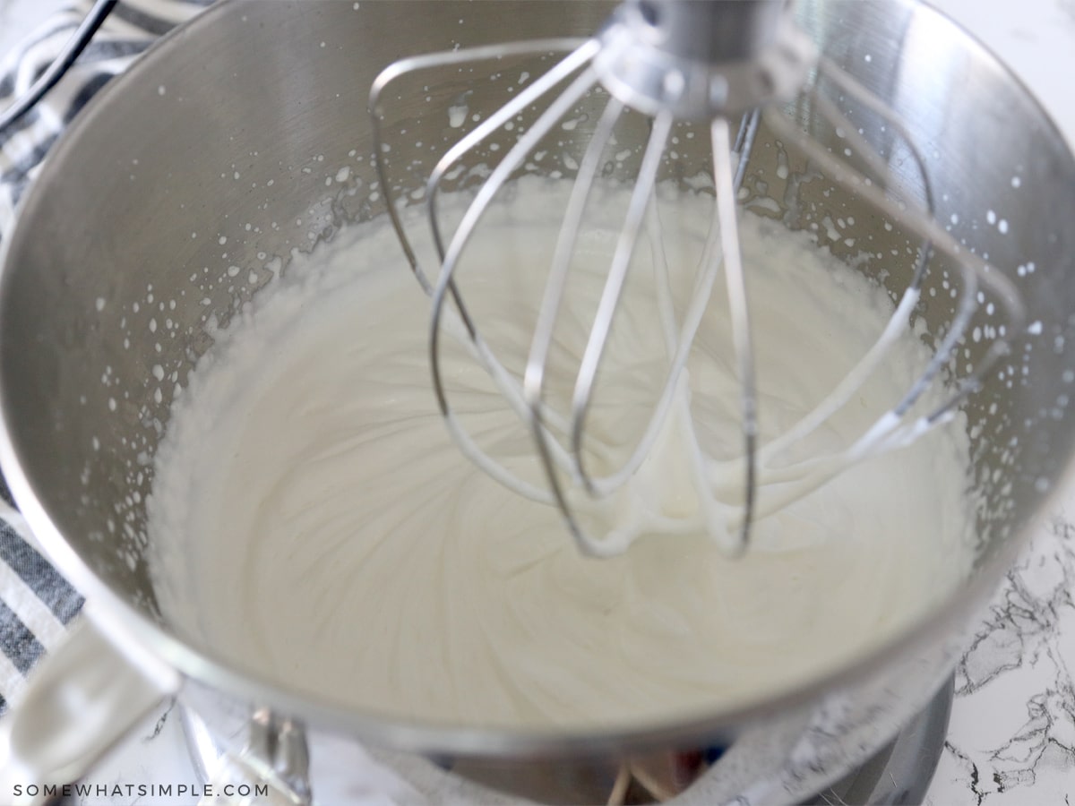 whipping cream in a mixing bowl