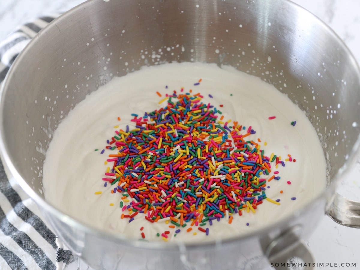 adding sprinkles to homemade ice cream