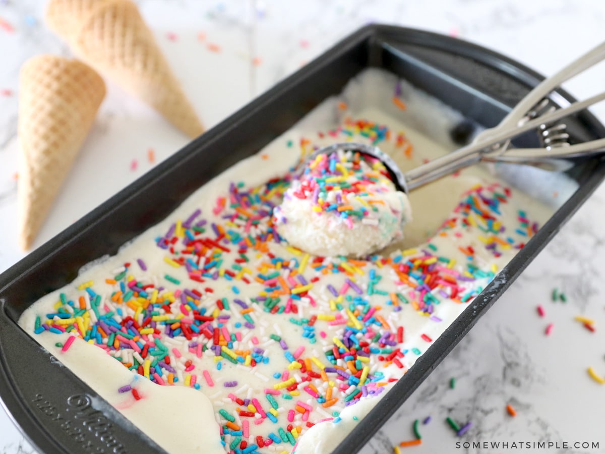 scooping birthday cake ice cream out of a bread pan
