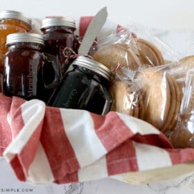 etched glass jelly jars in a bread gift basket